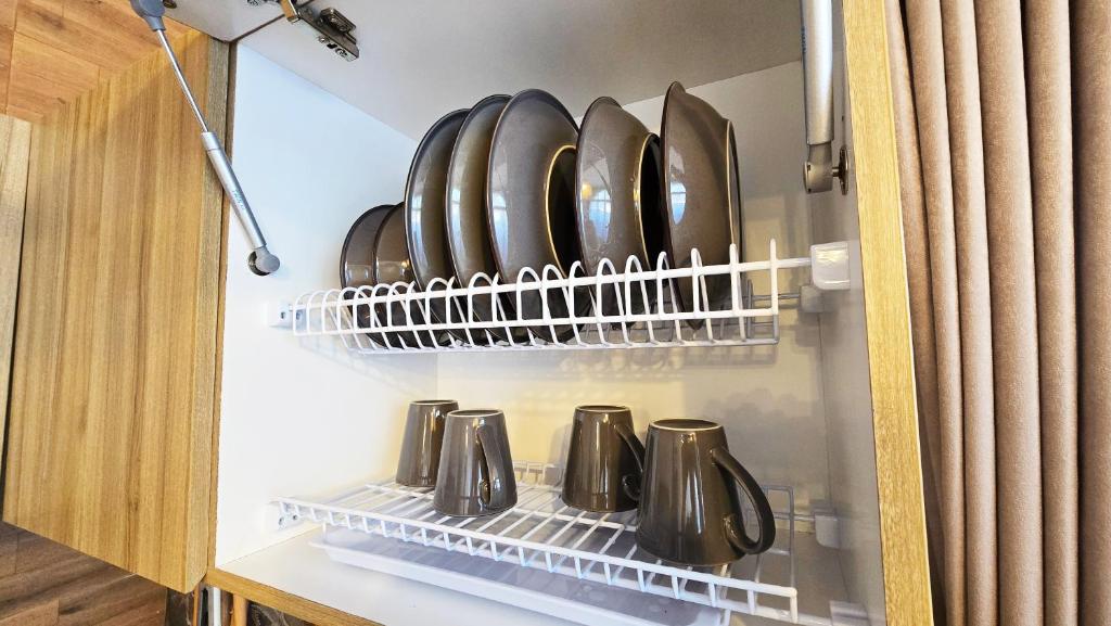 Tableware - 4 of each in the cabinet
